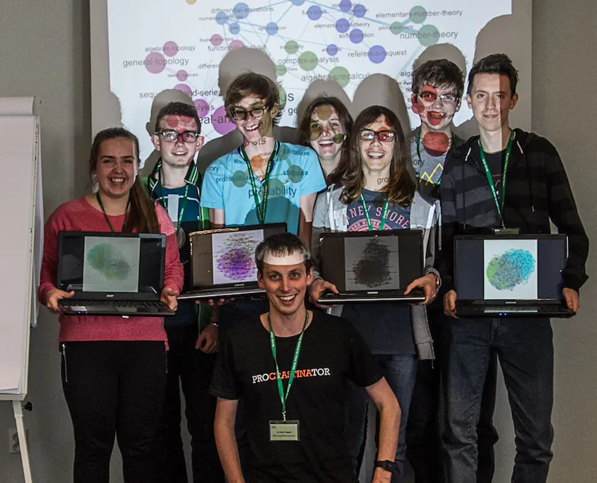 After "complex networks are simple" workshop on the multidisciplinary camp in 2015. Participants hold their graph visualization of Facebook networks, in Gephi.